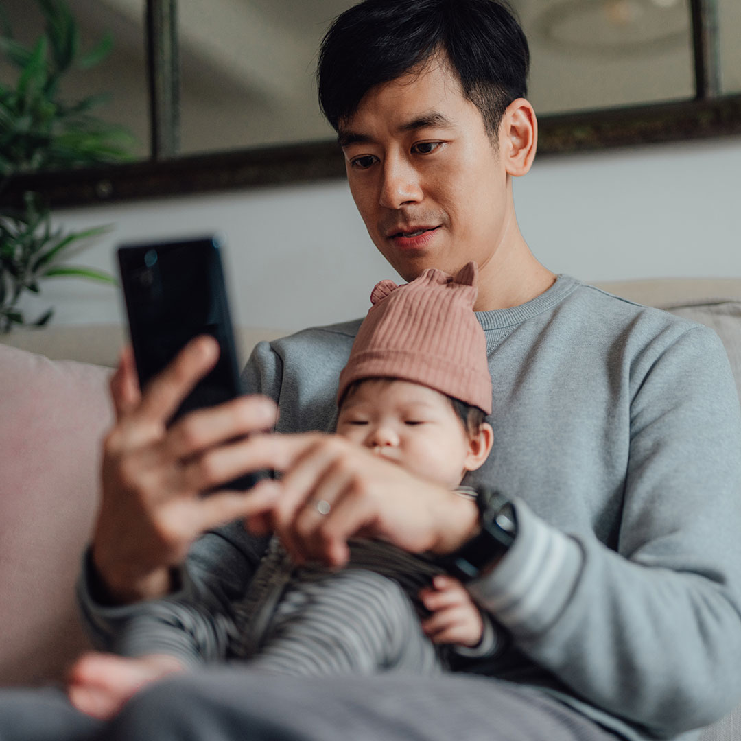 man looking at benefits on his phone