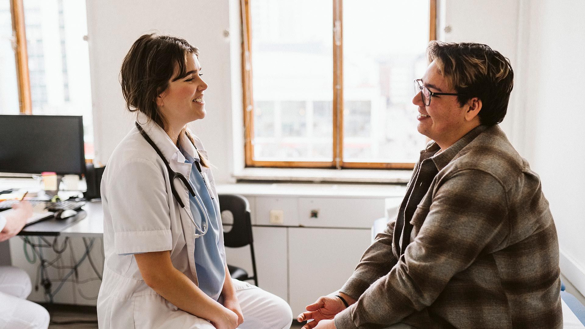 doctor talking to patient