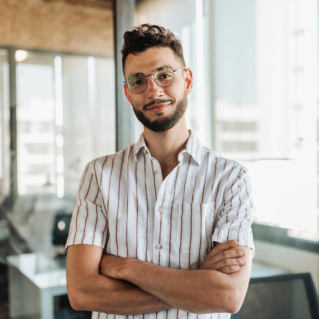 Portrait of a young man in an office setting