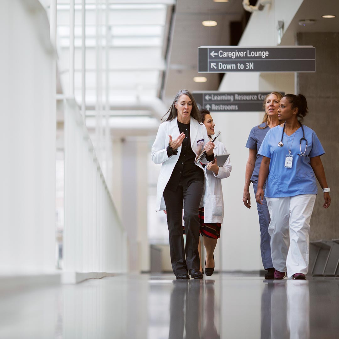 group of doctors walking in the hospital