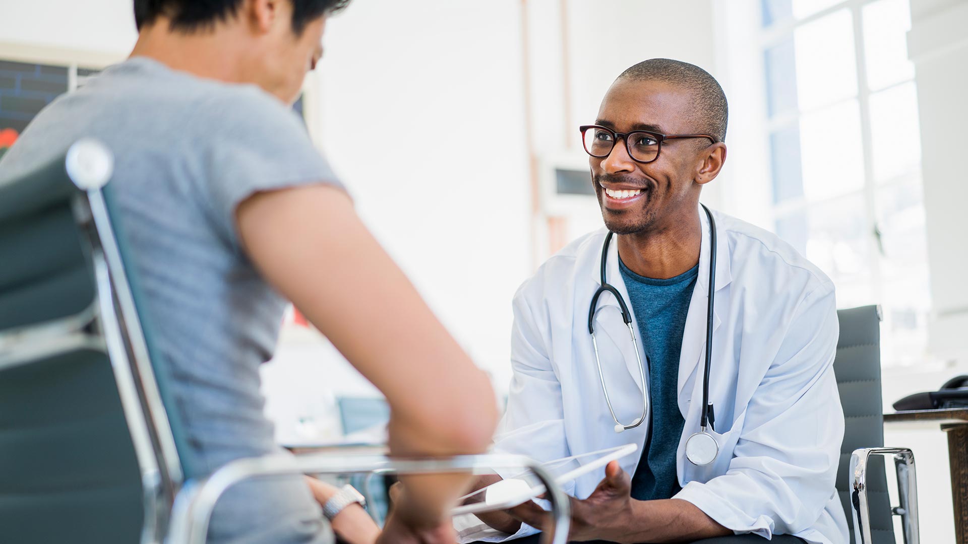 patient talking to doctor