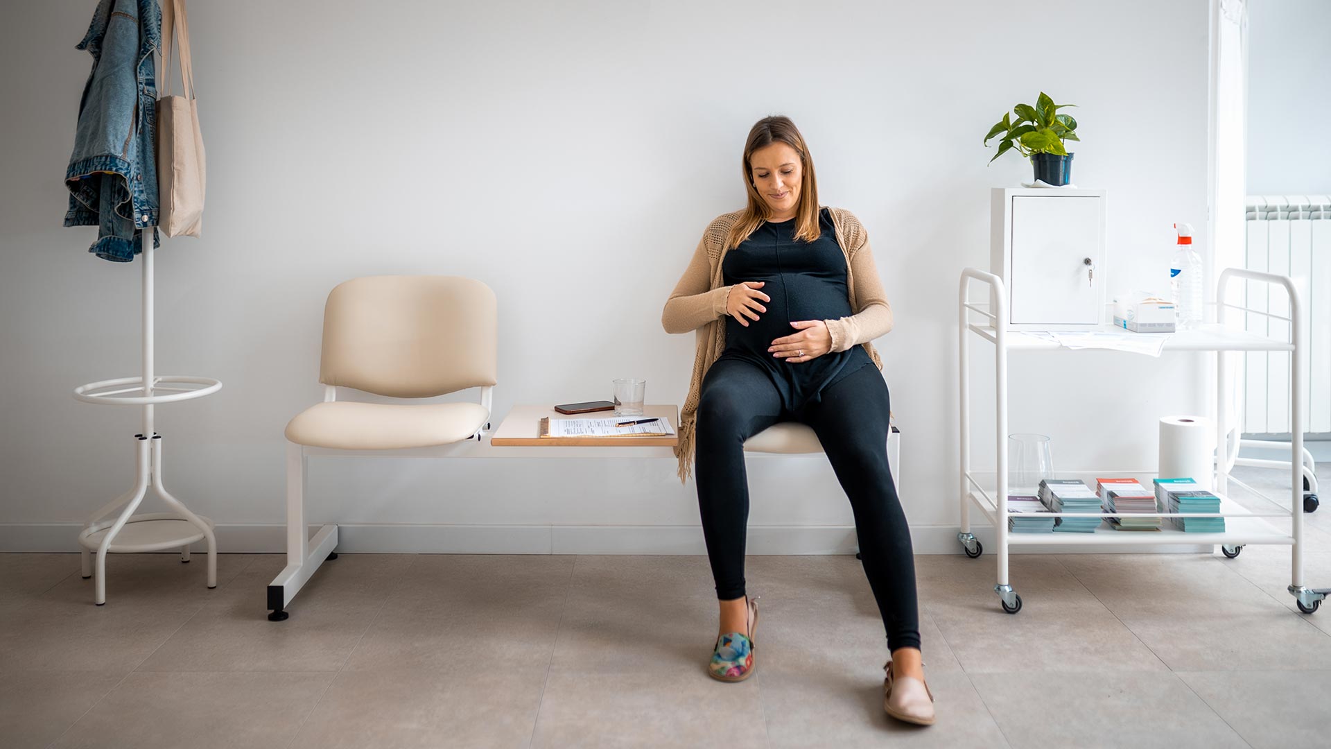 pregnant woman in  physician waiting room